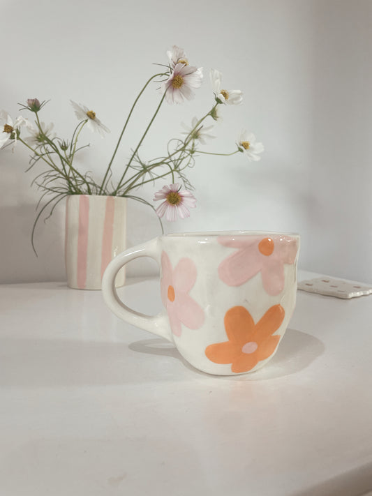 Pink and orange daisy mug
